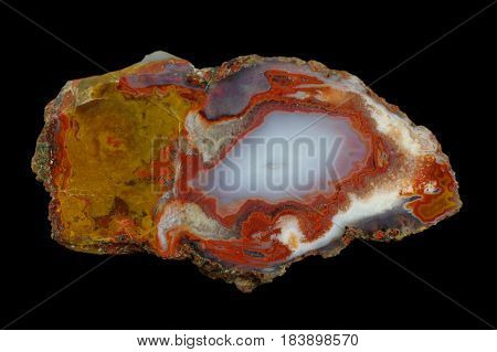 A cross section of the agate stone. Multicolored silica rings colored with metal oxides are visible. Origin: Asni Atlas Mountains Morocco.