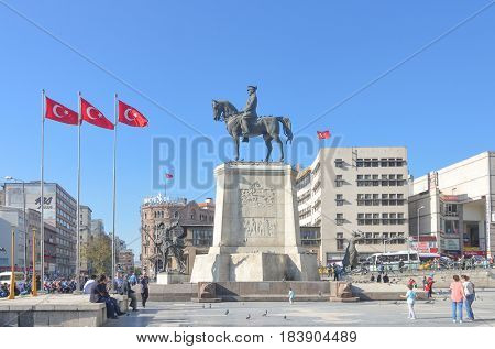 ANKARA, TURKEY - 28 APRIL 2017: The statue of Ataturk and national flags of modern Turkey in Ulus - Ankara, Turkey