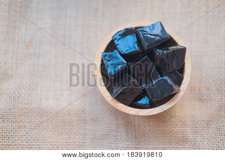 Grass jelly or vegetable jelly in wooden bowl Thai style sweet