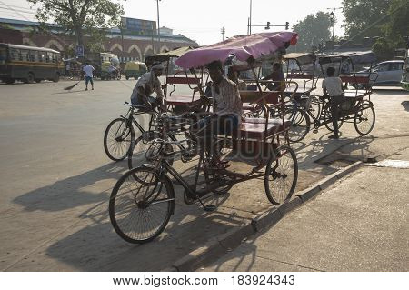 DELHI INDIA-JUL 25 : local rickshaw in front of old delhi railway station of delhi on july 25 2015 india. rickshaw is three wheeler bike taxi in any local area of delhi
