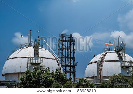 Gas storage spheres tank in refineryl plant on sky background.