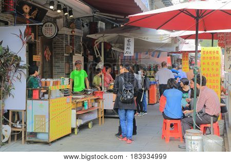 GUANGZHOU CHINA - NOVEMBER 12, 2016: Unidentified people visit Xiguan Antique city street market.