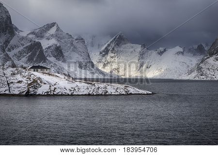 Beautiful sunset at Lofoten Islands Against Snowy Mountains in Norway.Horizontal Image