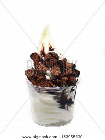 soft serve ice cream in a cup with topping