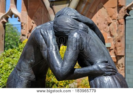 COVENTRY, UNITED KINGDOM - JUNE 4, 2015 - Reconciliation statue inside the ruins of the old Cathedral Coventry West Midlands England UK Western Europe, June 4, 2015.