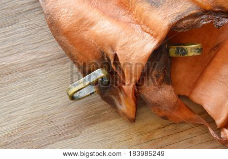 dog snack dried ear cow with loop for sure real meat on wooden board