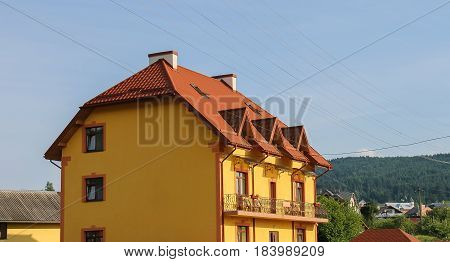 Modern cottages on of forested mountains. Carpathians Ukraine
