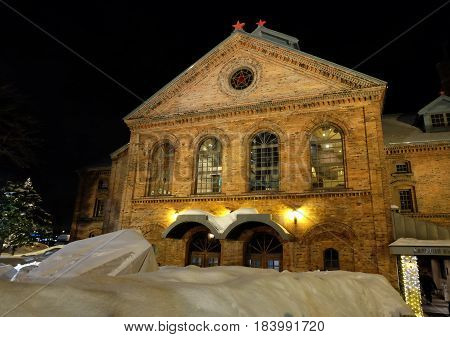 SAPPORO JAPAN - JANUARY 18 2017: Sapporo Beer Museum at night. The building was first opened as Kaitakushi Brewery in 1876