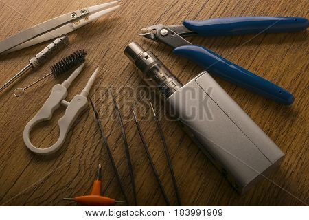 Vape Device Or Electronic Cigarette With Vaping Tools And Accessories.
