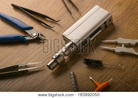 Vape Device Or Electronic Cigarette With Vaping Tools And Accessories.