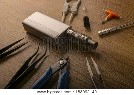 Vape Device Or Electronic Cigarette With Vaping Tools And Accessories.