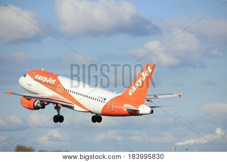 Amsterdam the Netherlands - April 7th 2017: G-EZFO easyJet Airbus A319-100 takeoff from Polderbaan runway Amsterdam Airport Schiphol