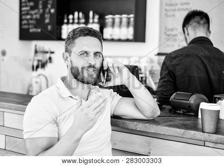 Lets Meet In Cafe. Man Mobile Conversation Cafe Barista Background. Drink Coffee While Waiting. Coff