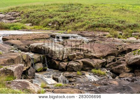 The Karkloof River Flowing Over Rocks In The Natal Midlands, South Africa.