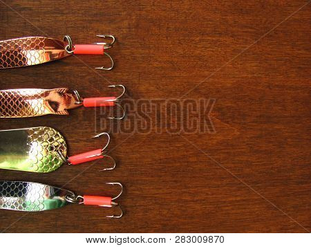 Kramatorsk, Ukraine - 19th March, 2018: Four Shiny Artifician Baits: Details Of Fishing Spinners Lef