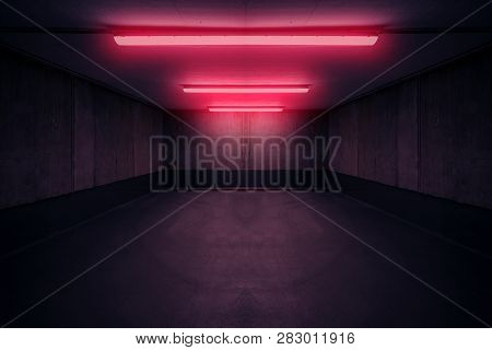 Dark Underground Room With Red Neon Light In Basement Or Parking Lot