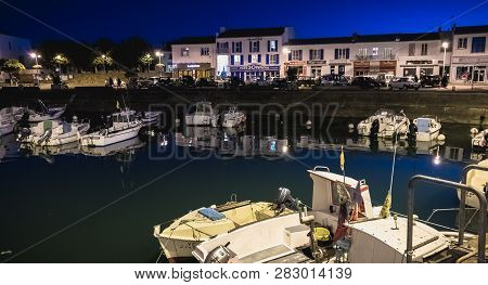 Main Port Of The Yeu Island With Its Picturesque Architecture And Its Fishing Boats