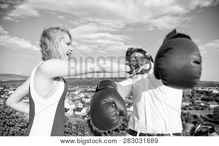 Signs You Are Henpecked Husband. Leadership Family Relations. Couple Boxing Gloves Fight Sky Backgro