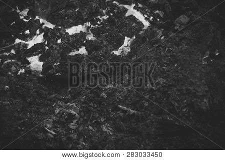 Magma Textured Molten Rock Surface. Lava Flame On Black Ash Background. Volcano, Fire, Crust. Format