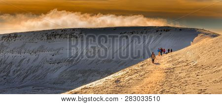 Editorial Brecon Beacons, South Wales, Uk - January 19, 2016: Hikers On The Approach To Penyfan, The