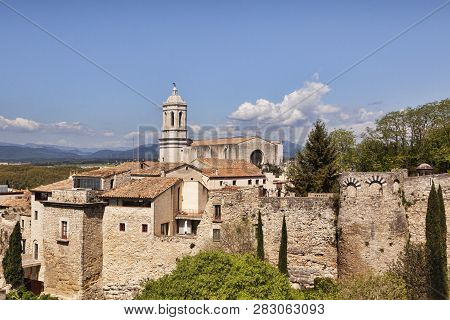 The Cathedral Of St Mary Of Girona, And The Old City Wall,  Girona, Catalonia, Spain.