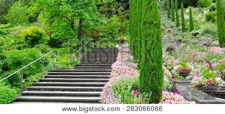 Flower Garden And Other Plants, A Staircase And A Waterfall On The Island Of Mainau (lake Constance,