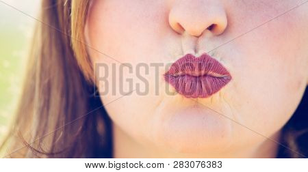 Cherry Red Lips Of Young Girl Are Kissing