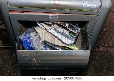 Paris, France - Jan 1, 2019: Full With Champagne Bottle And Fireworks Packages Bigbelly Smart Waste 