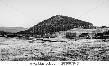 Bukovec Mountain Above Jizerka Village In Jizera Mountains, Czech Republic. Clear Sunny Day
