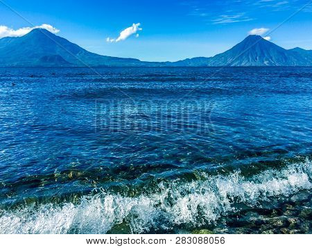 Atitlan, Toliman & San Pedro Volcanoes On Lake Atitlan In Guatemalan Highlands, Central America