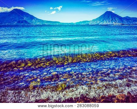 Atitlan, Toliman & San Pedro Volcanoes On Lake Atitlan In Guatemalan Highlands, Central America