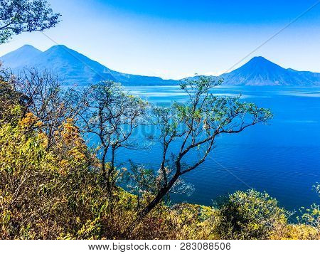 Atitlan, Toliman & San Pedro Volcanoes On Lake Atitlan In Guatemalan Highlands, Central America