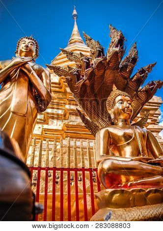 Beautiful Golden Buildings And Statues Within The Temple Complex..