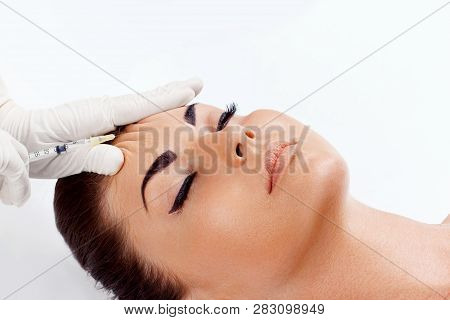 Cosmetology Procedure. Woman Receiving Face Skin Lift Injections. Beauty Injections. Female On Rejuv