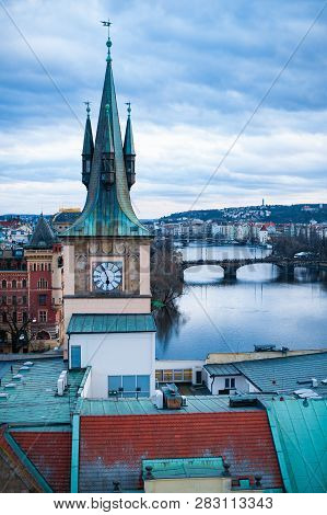 View On The Roofs In Stare Misto. Prague. Sunset