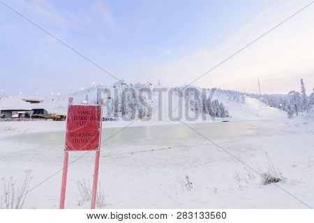Rukatunturi Ski Jumping Hill In Winter Season And Nice Weather And Blue Sky In Winter Season And Sun