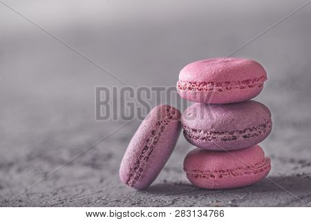 Beautiful Colorful Delicious Desserts Makarons, Stack On Gray Stone Background