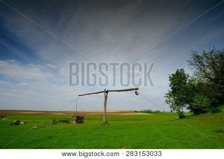 Shadoof On The Pasture. Rural Hungarian Landscape