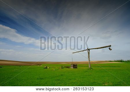 Shadoof On The Pasture. Rural Hungarian Landscape