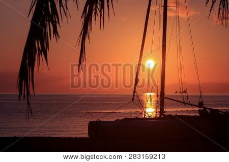 Hobie Cat Or Catamaran On The Beach At Beautiful Sunrise Early Morning, Silhouette Asian Man With Pa