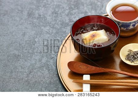 oshiruko, sweet red bean soup with grilled mochi (rice cake), japanese traditional dessert
