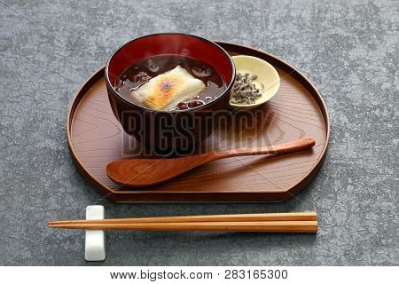 oshiruko, sweet red bean soup with grilled mochi (rice cake), japanese traditional dessert
