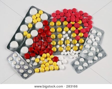 Tabletten mehrfarbig und weiß In Verpackung