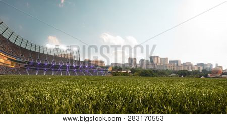Empty Stadium Around Blue Sky Day And Sity Landscape