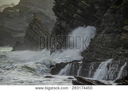 Sea Waves Breaking In The Coast Cliffs In Barrika