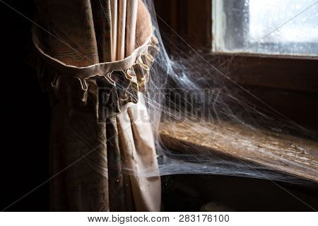 Urbex (urban Exploration) Curtain With Spider Web In An Abandoned Villa