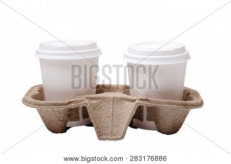 Two Take-out Coffee In Holder. Isolated On A White. Two Take Out Coffee Cups In Pressed Cardboard Cu