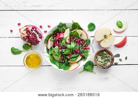 Spinach, Apple Salad With Pomegranate Seeds