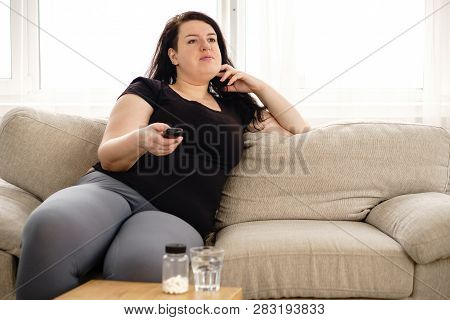 Weight Loss, Therapy, Hypertension, Diabetes, Migraine, Medical Concept. Fat Obese Woman With Pills