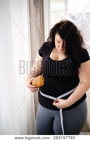 Stress, Eating Problems, Compulsive Overeating, Fat Food, Weight Gain. Overweight Woman With Croissa